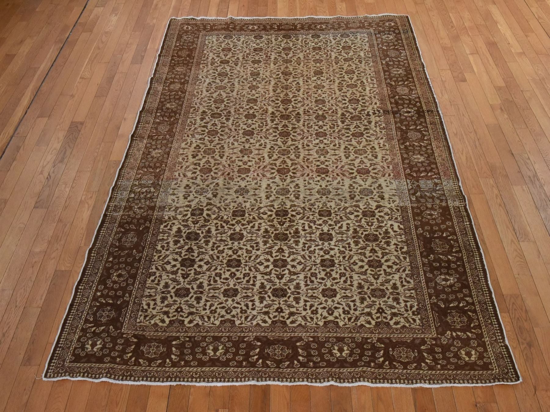 Ivory 6'6" x 9'5" Vintage Hand knotted Wool Rug - Sku: O078586