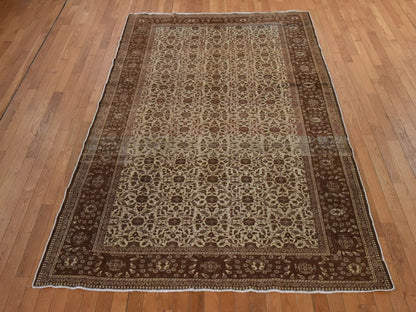 Ivory 6'6" x 9'5" Vintage Hand knotted Wool Rug - Sku: O078586
