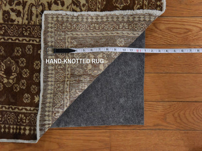 Ivory 6'6" x 9'5" Vintage Hand knotted Wool Rug - Sku: O078586