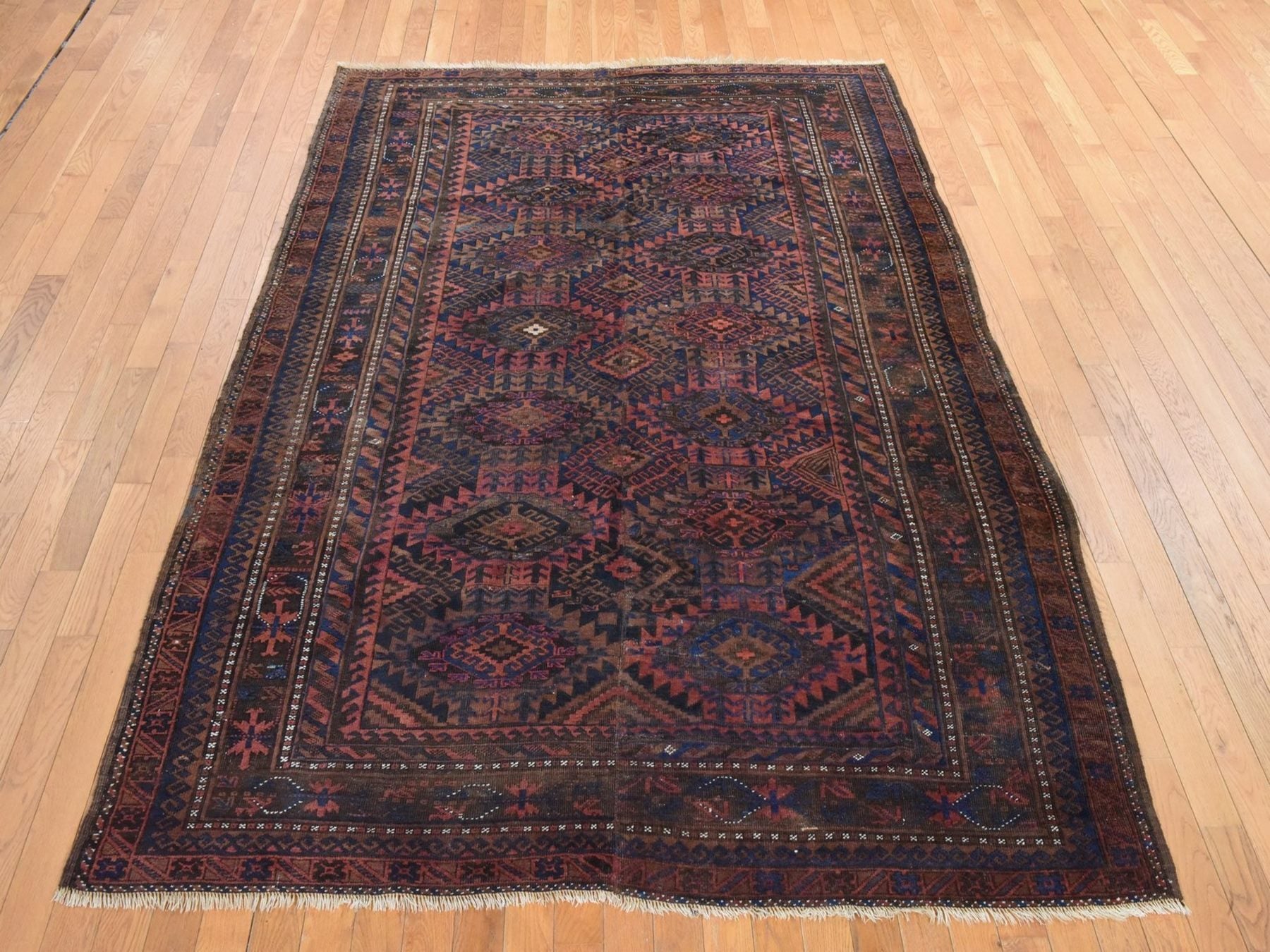 Antique hand-knotted wool rug in Red & Brown, 6'4" x 9' — SKU O078599 (view 2)