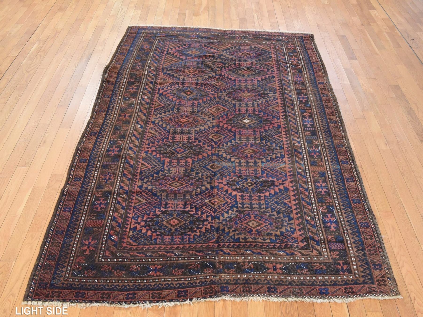Antique hand-knotted wool rug in Red & Brown, 6'4" x 9' — SKU O078599 (view 3)