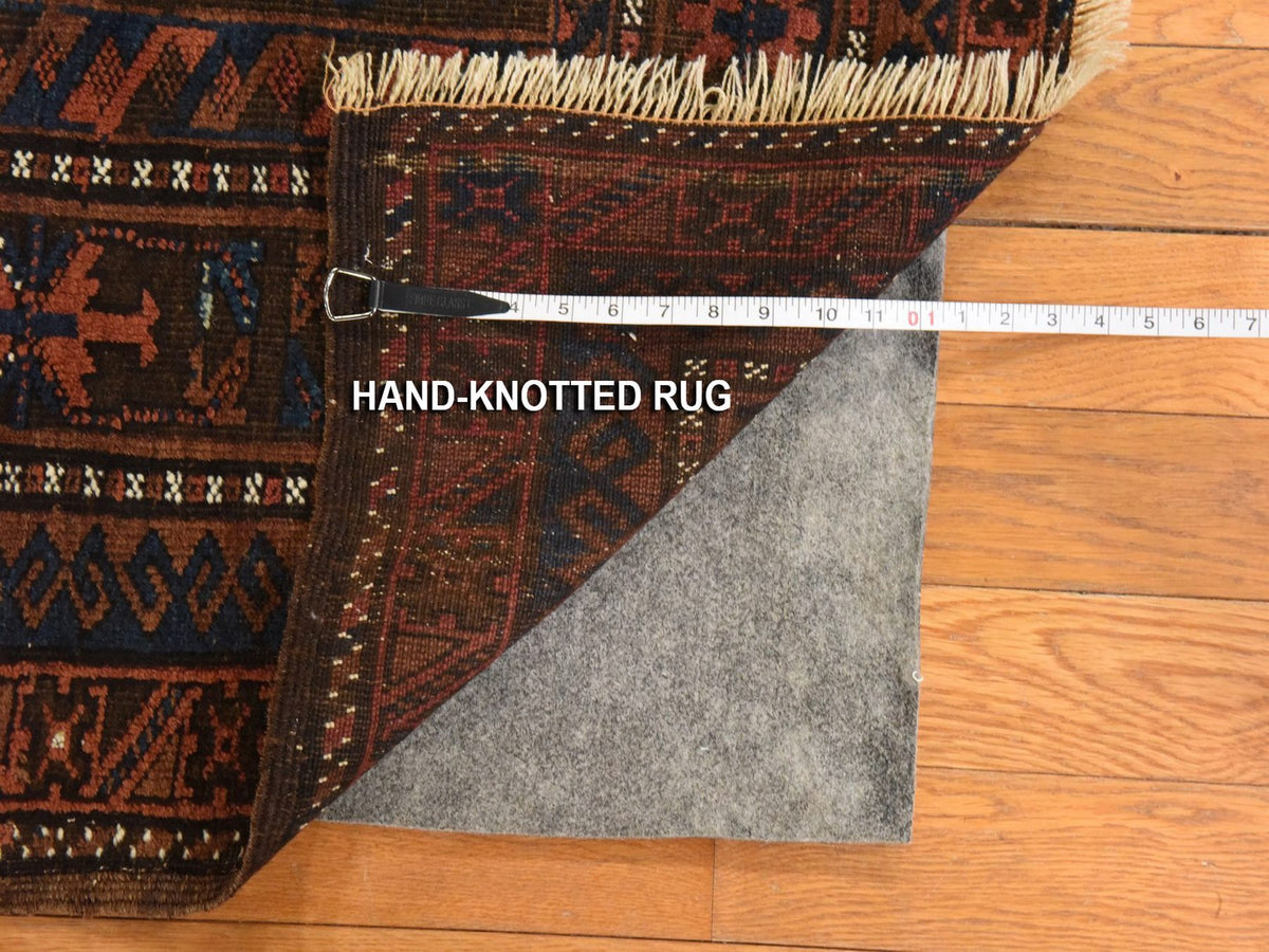Antique hand-knotted wool rug in Red & Brown, 6'4" x 9' — SKU O078599 (view 7)