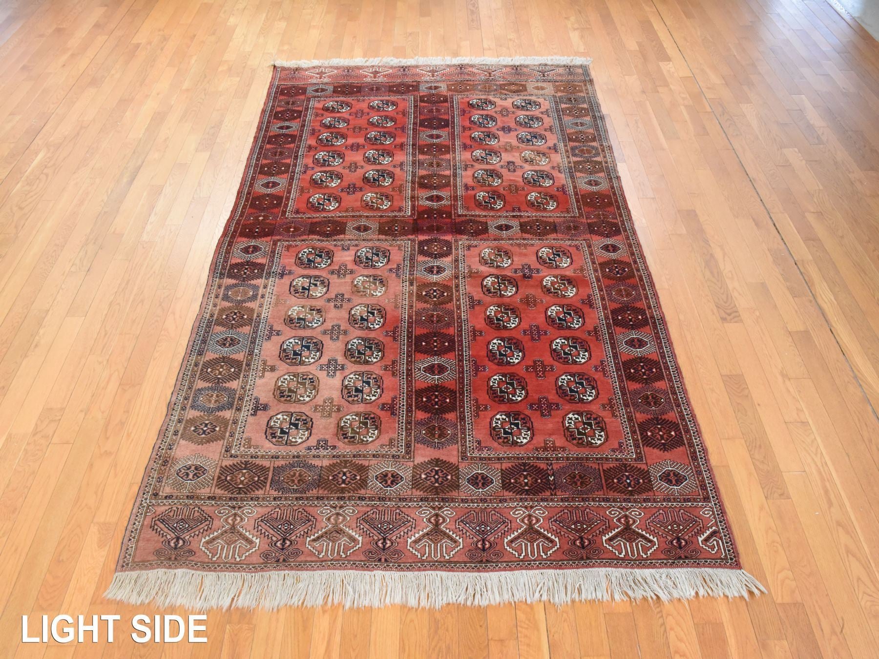 Vintage hand-knotted wool rug in Red, 6'3" x 10'3" — SKU O078628 (view 3)