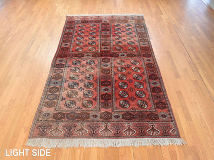 Vintage hand-knotted wool rug in Red, 6'3" x 10'3" — SKU O078628 (view 3)