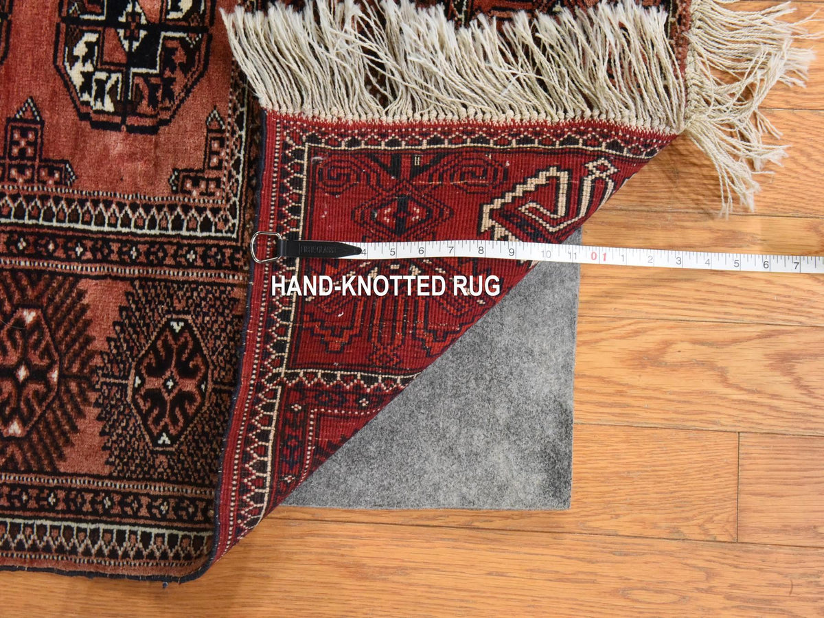 Vintage hand-knotted wool rug in Red, 6'3" x 10'3" — SKU O078628 (view 7)