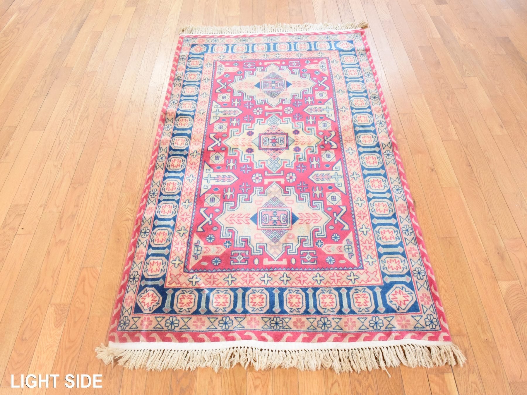 Kazak hand-knotted wool rug in Pink & Blue, 3'10" x 6' — SKU O078634 (view 3)