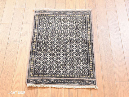 Tribal & Geometric hand-knotted wool rug in Ivory, 1'6" x 2'2" — SKU O078657 (view 3)