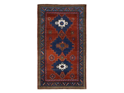 Kazak Antique hand-knotted wool rug in Red & Blue, 4'9" x 8'3" — SKU O078779
