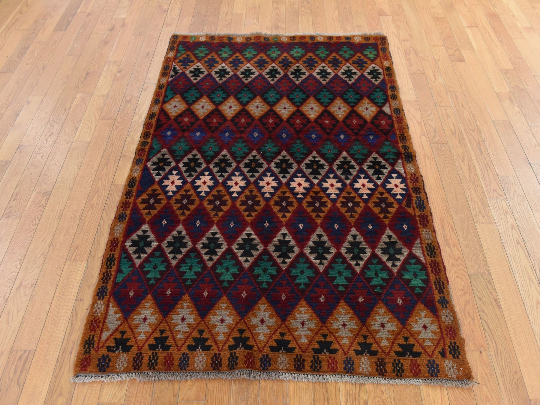 Tribal hand-knotted wool rug in Red, 4'1" x 5'9", SKU O078780