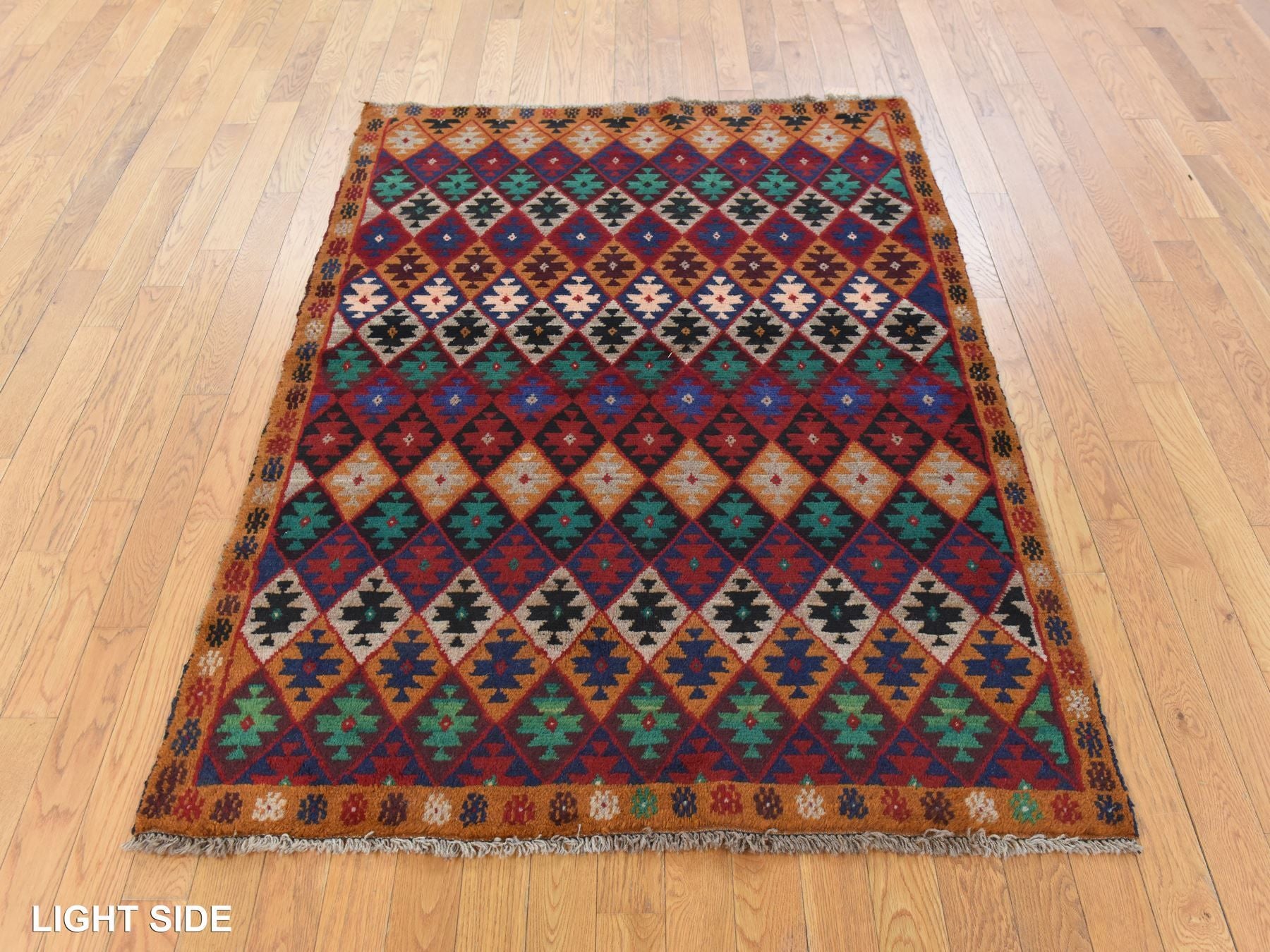 Tribal hand-knotted wool rug in Red, 4'1" x 5'9", SKU O078780