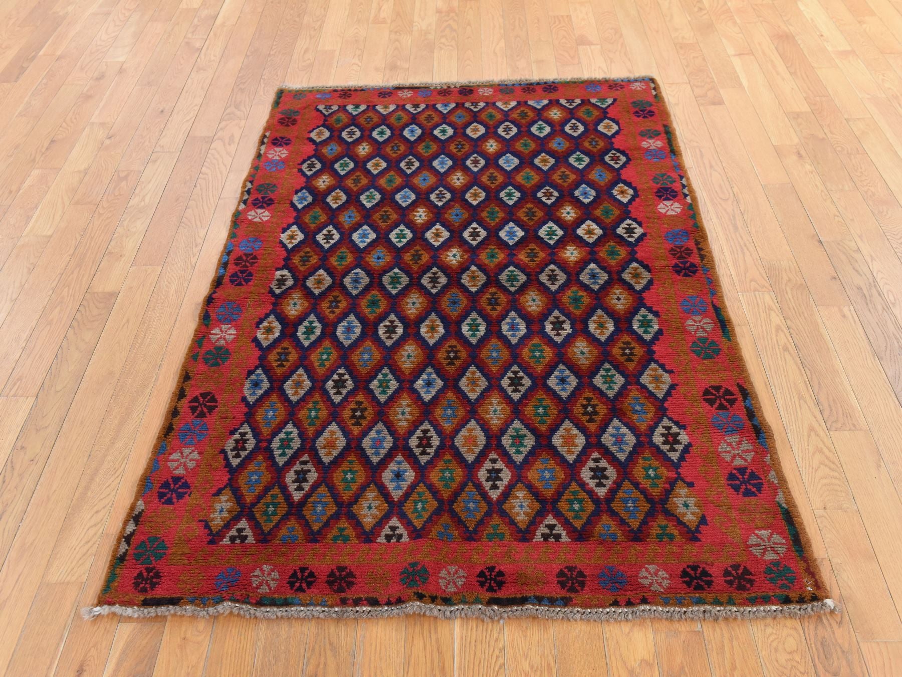 Tribal hand-knotted wool rug in Red, 4'0" x 6'1", SKU O078783