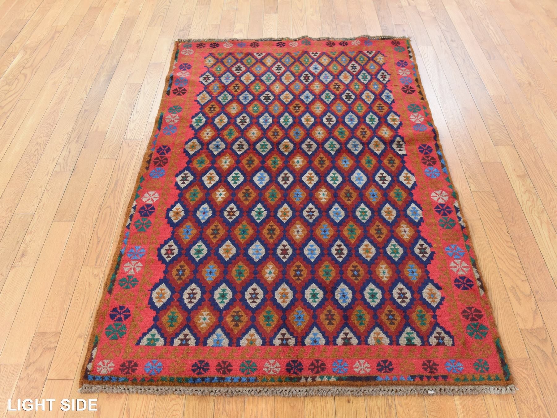 Tribal hand-knotted wool rug in Red, 4'0" x 6'1", SKU O078783