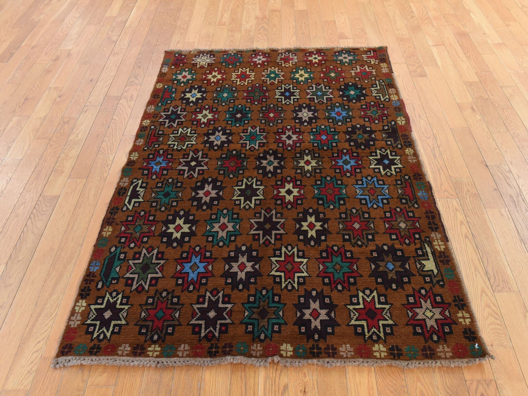 Baluch Tribal & Geometric hand-knotted wool rug in Brown, 4'1" x 6'1" — SKU O078785 (view 2)