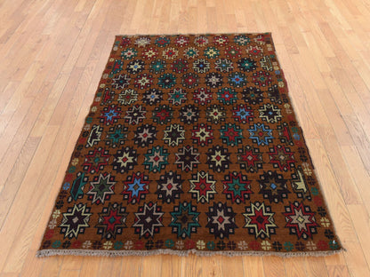 Baluch Tribal & Geometric hand-knotted wool rug in Brown, 4'1" x 6'1" — SKU O078785 (view 2)