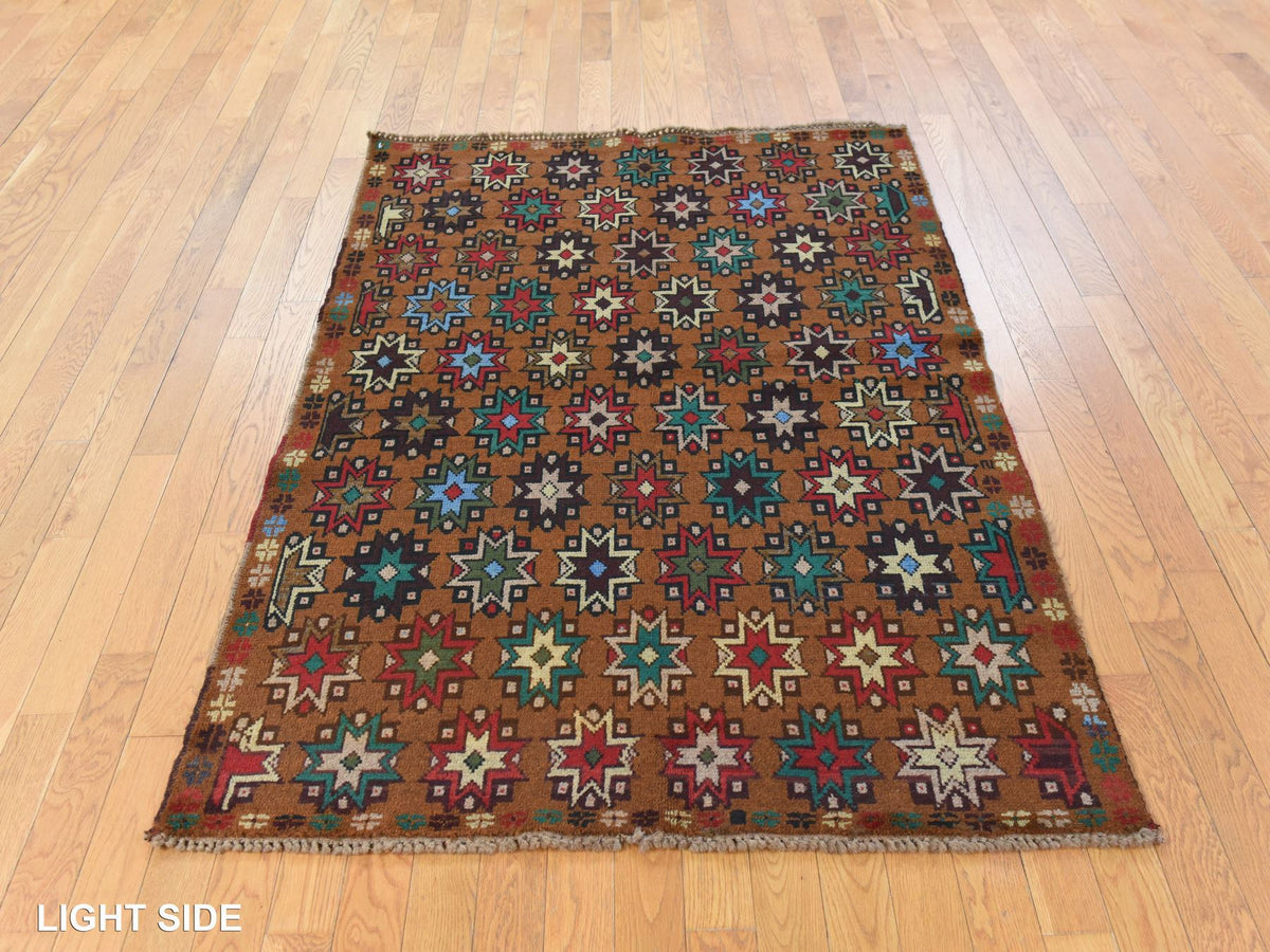 Baluch Tribal & Geometric hand-knotted wool rug in Brown, 4'1" x 6'1" — SKU O078785 (view 3)