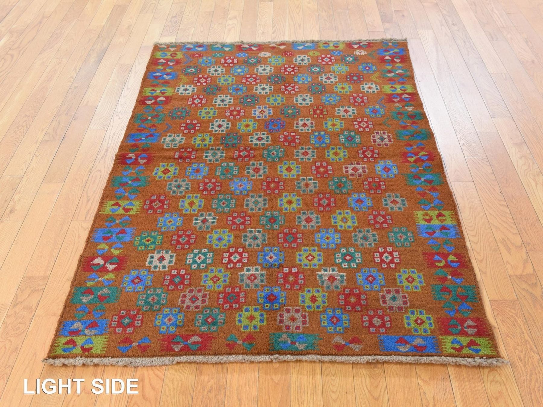 Baluch Tribal hand-knotted wool rug in Brown, 4'1" x 5'9", SKU O078795 (view 3)