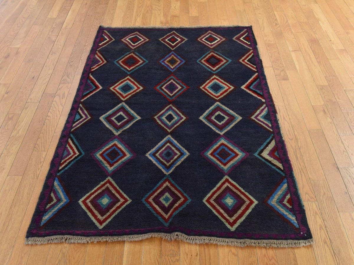 Baluch Tribal hand-knotted wool rug in Blue, 4'2" x 5'7", SKU O078801 (view 2)