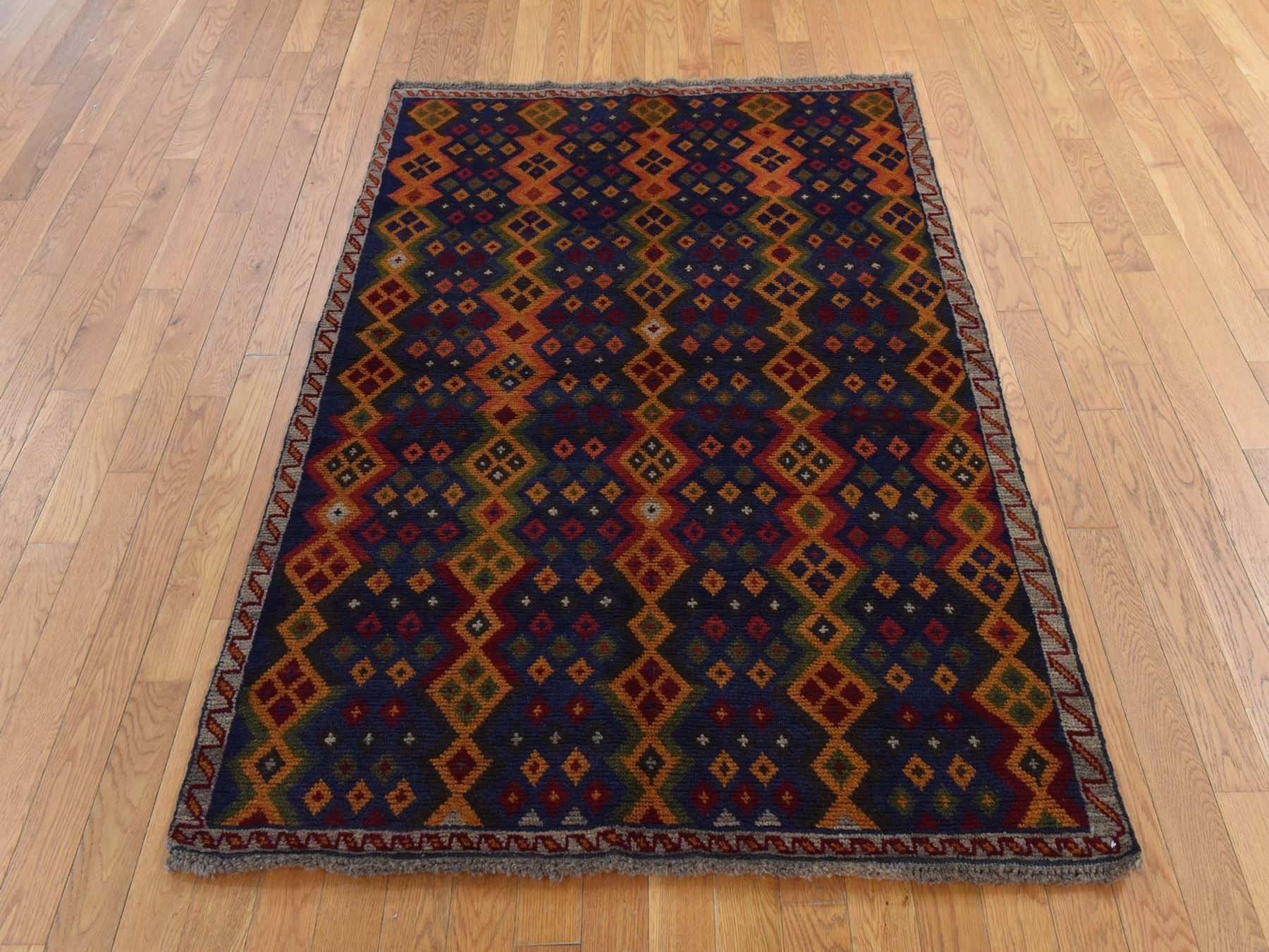 Baluch Tribal hand-knotted wool rug in Blue, 4'1" x 5'8", SKU O078803 (view 2)