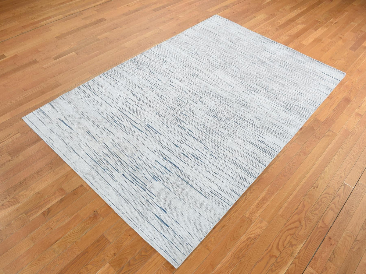 Modern / Contemporary hand-knotted wool rug in Ivory, 6'1" x 9'4" — SKU O080991 (view 3)