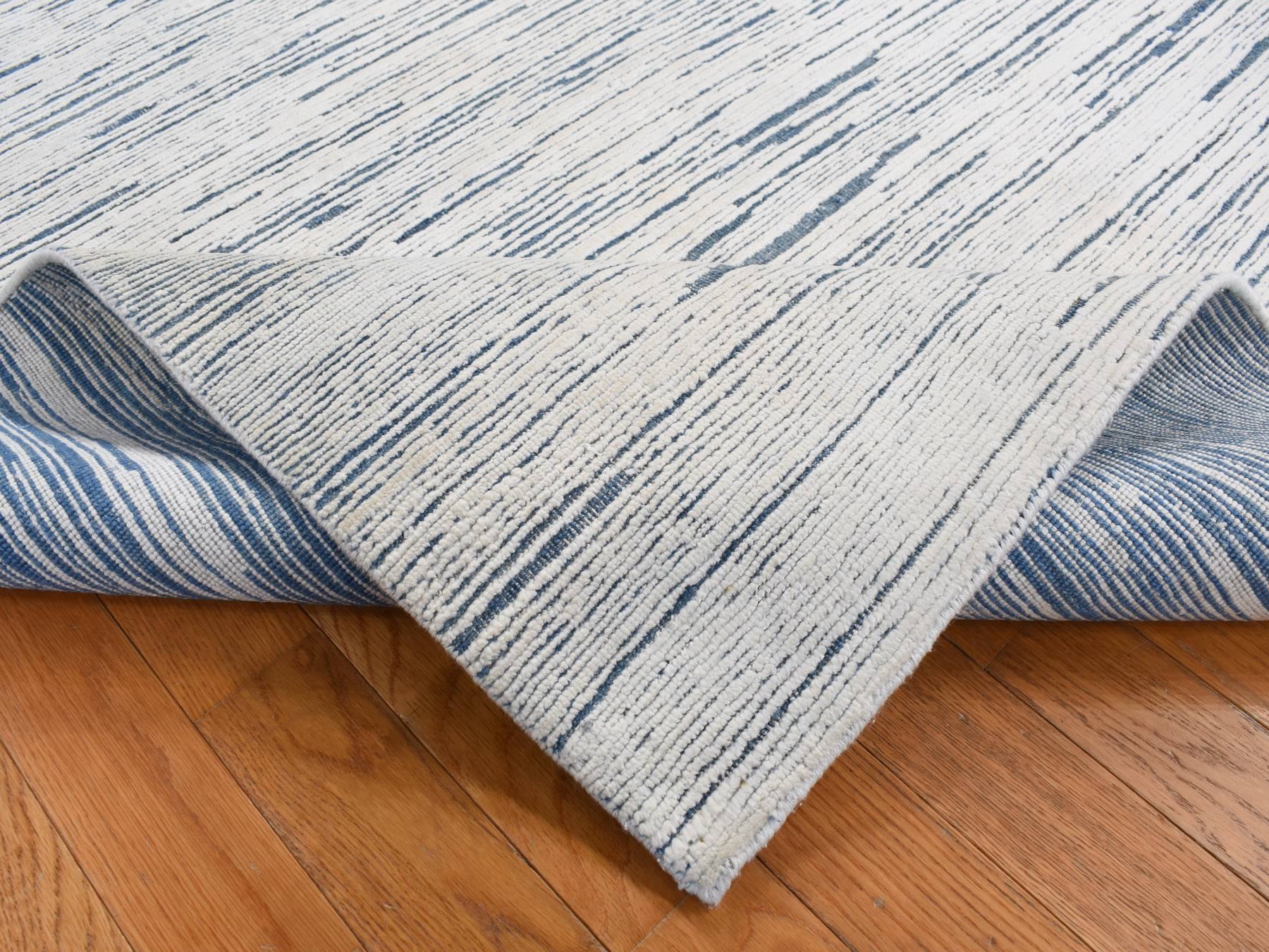 Modern / Contemporary hand-knotted wool rug in Ivory, 6'1" x 9'4" — SKU O080991 (view 5)