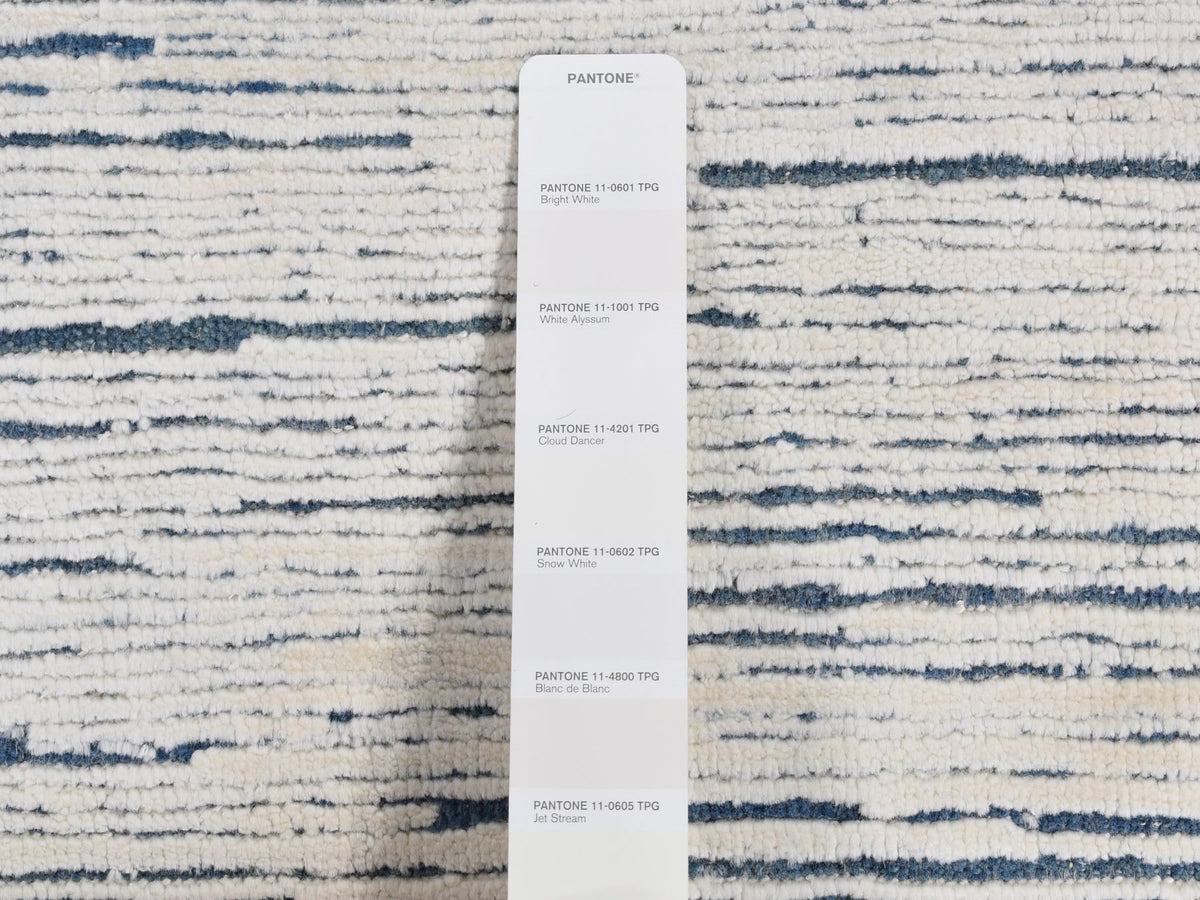 Modern / Contemporary hand-knotted wool rug in Ivory, 6'1" x 9'4" — SKU O080991 (view 7)