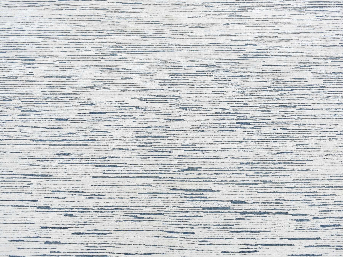 Modern / Contemporary hand-knotted wool rug in Ivory, 6'1" x 9'4" — SKU O080991 (view 8)