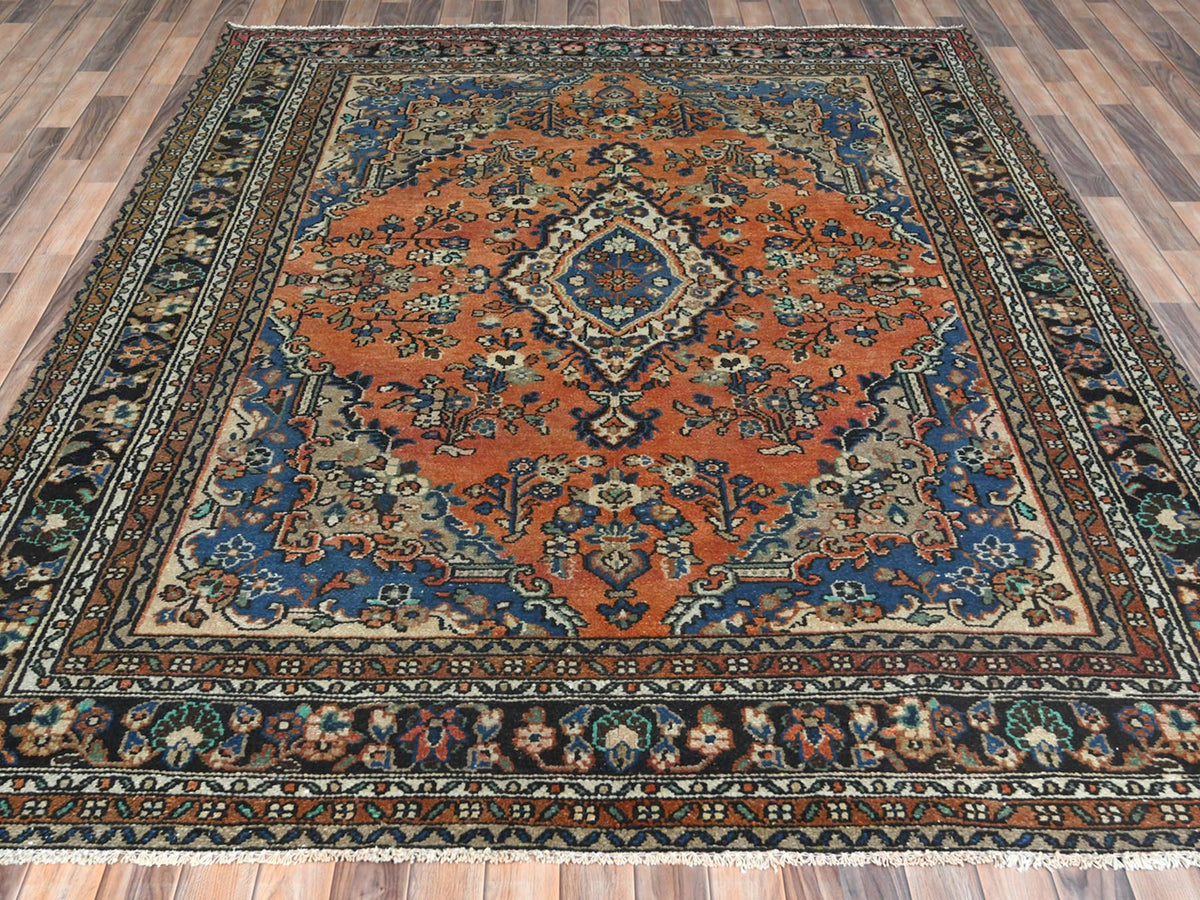 Vintage hand-knotted worn wool rug in Orange & Black, 7'4" x 10' — SKU O081169 (view 3)