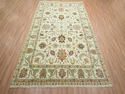 Ivory 6'1" x 9'3" Tribal Hand knotted Wool Rug - Sku: O083205