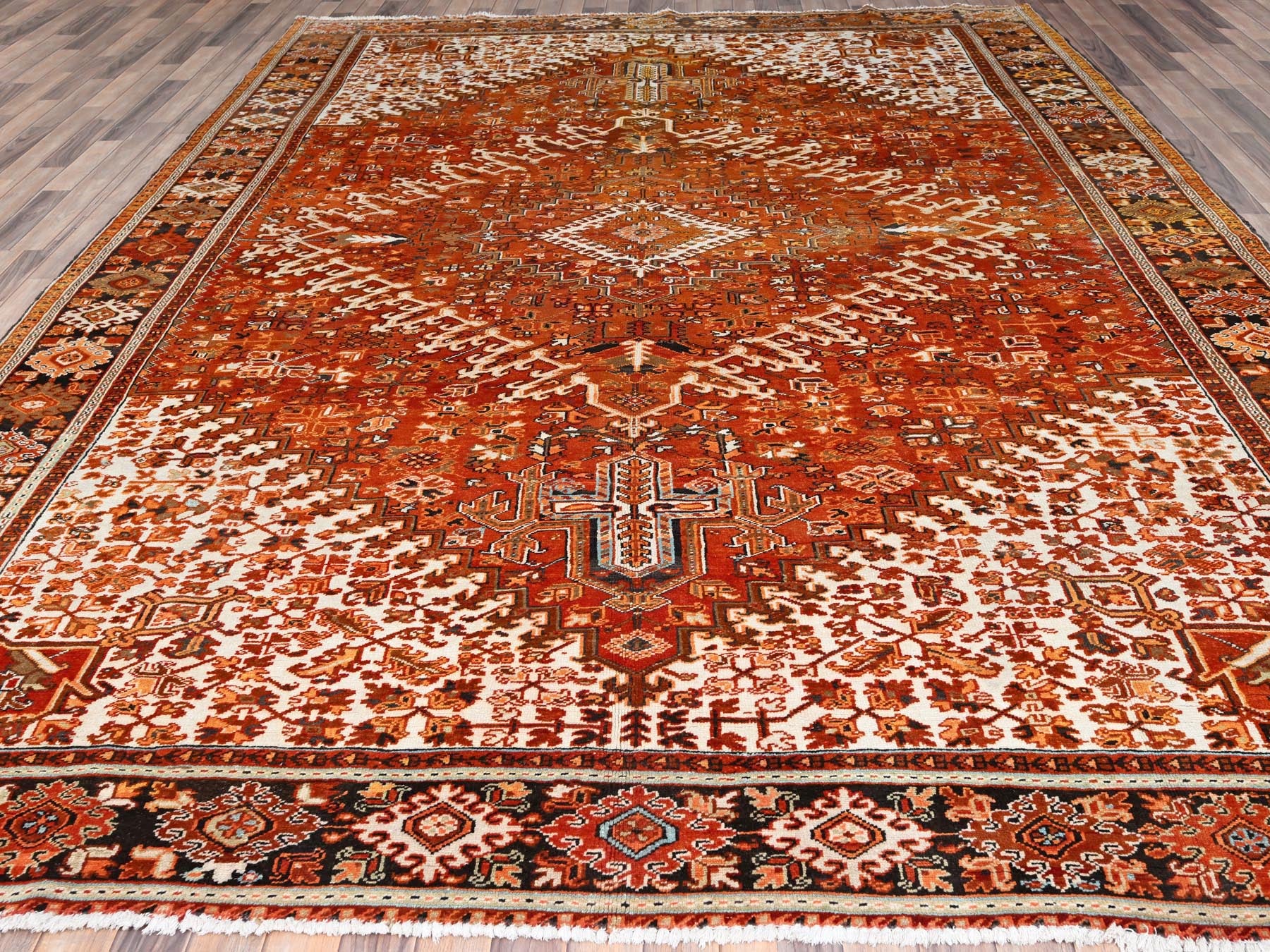Heriz Heriz hand-knotted worn wool rug in Orange & Black, 10'2" x 13' — SKU O085656 (view 2)