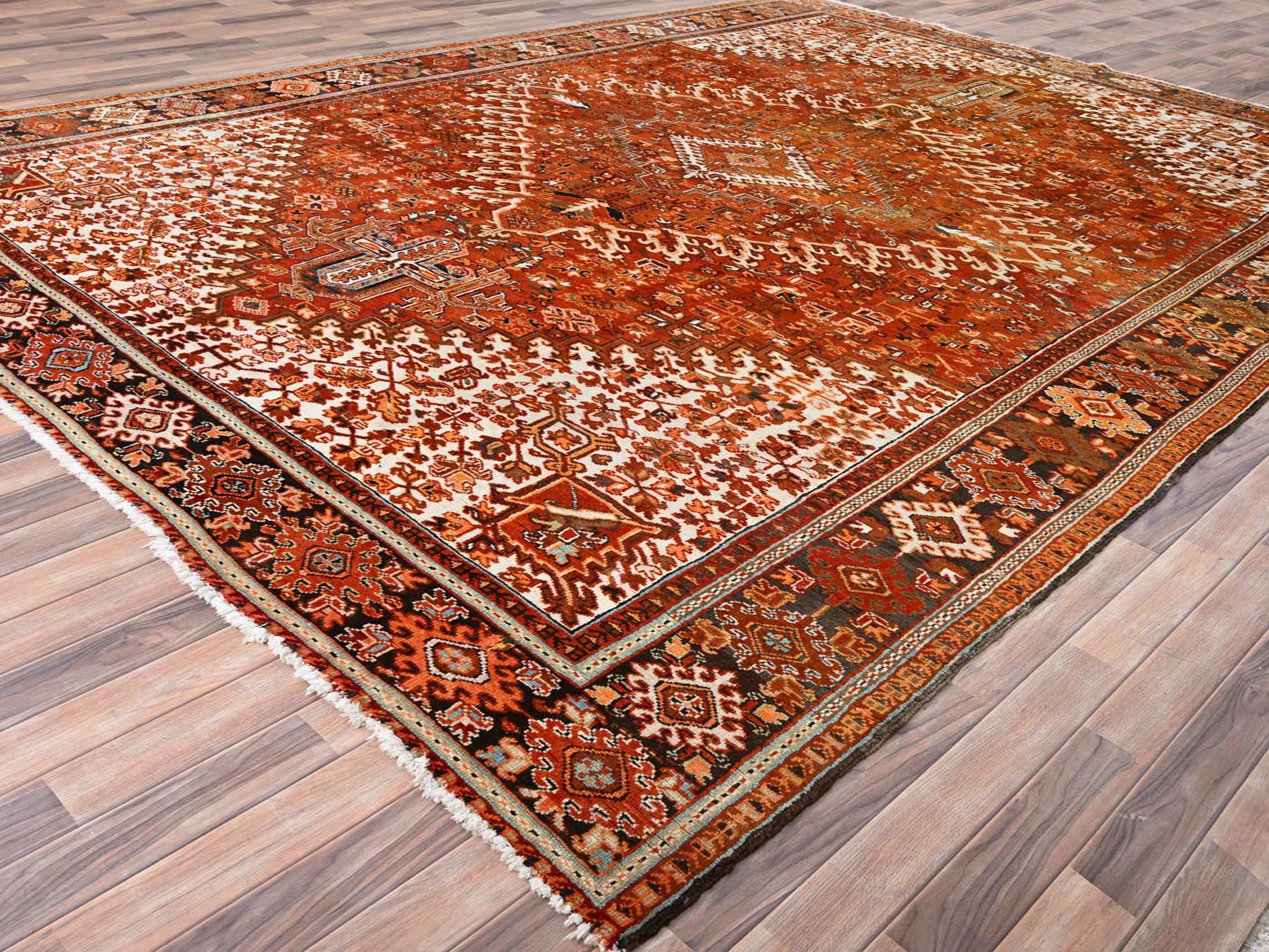 Heriz Heriz hand-knotted worn wool rug in Orange & Black, 10'2" x 13' — SKU O085656 (view 3)