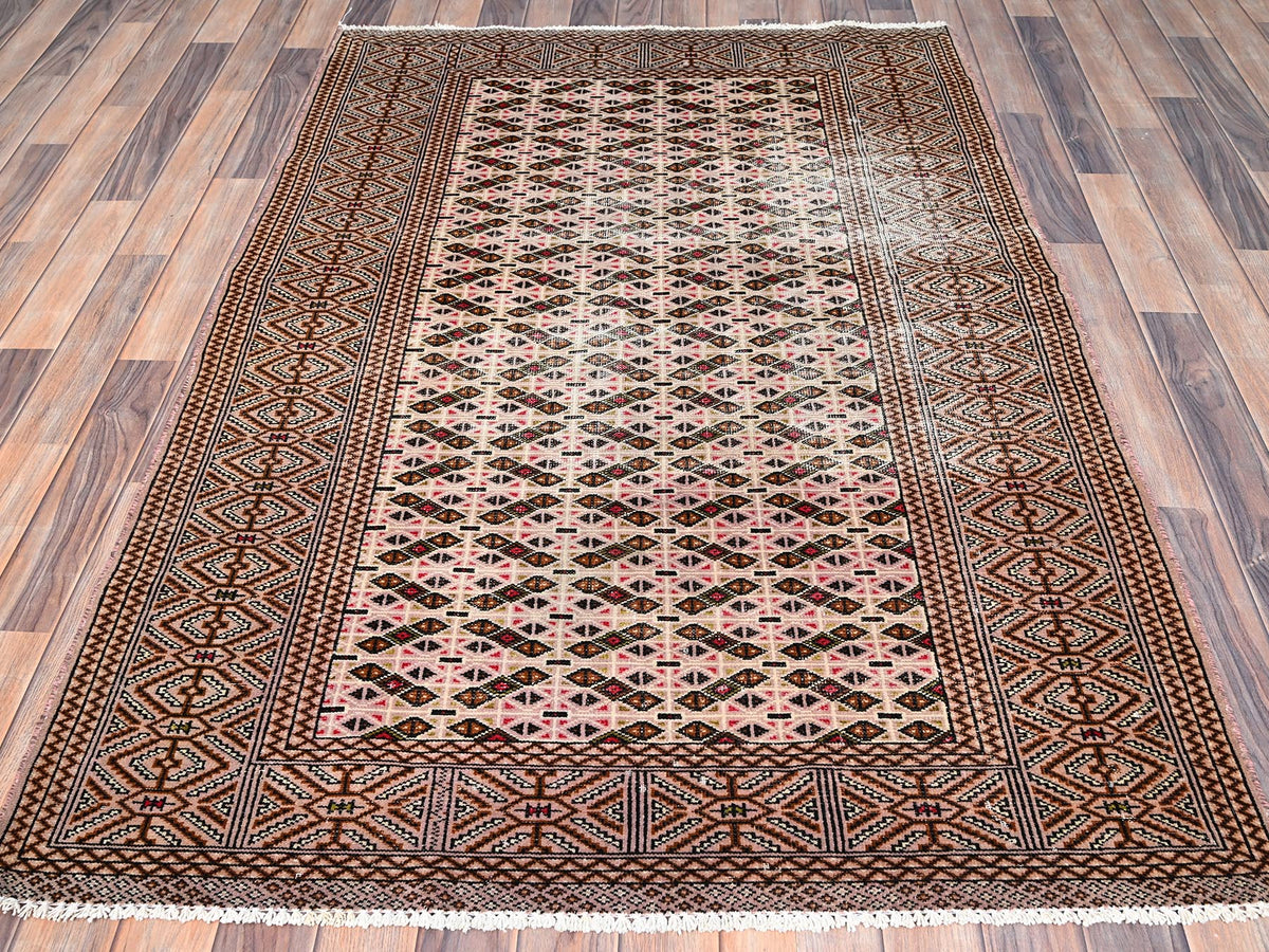 Vintage hand-knotted wool rug in Pink, 4'4" x 6'1" — SKU O086057 (view 2)