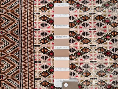 Vintage hand-knotted wool rug in Pink, 4'4" x 6'1" — SKU O086057 (view 4)