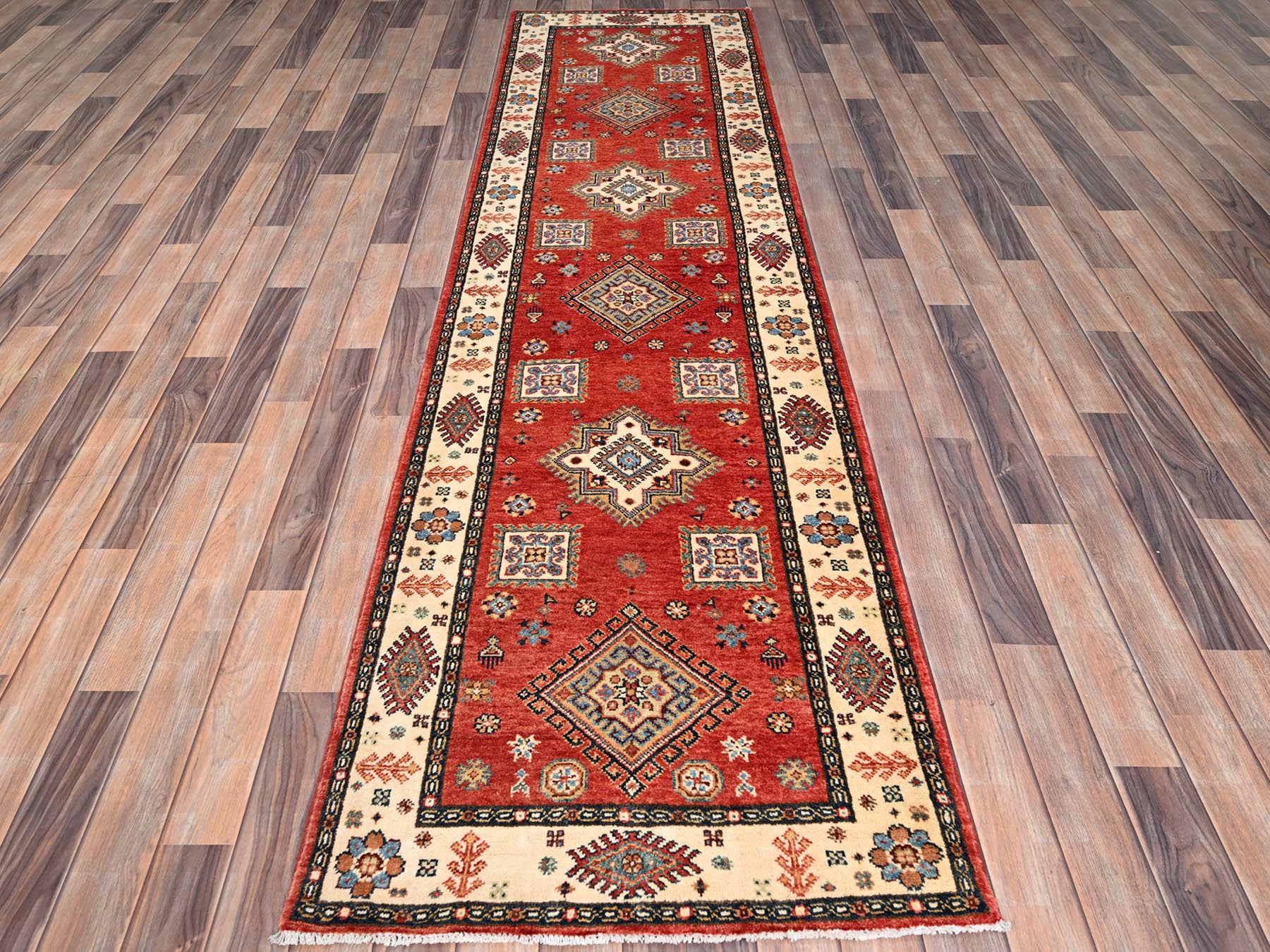Kazak Kazak hand-knotted wool runner in Red & Ivory, 2'8" x 9'6" — SKU O086450 (view 2)