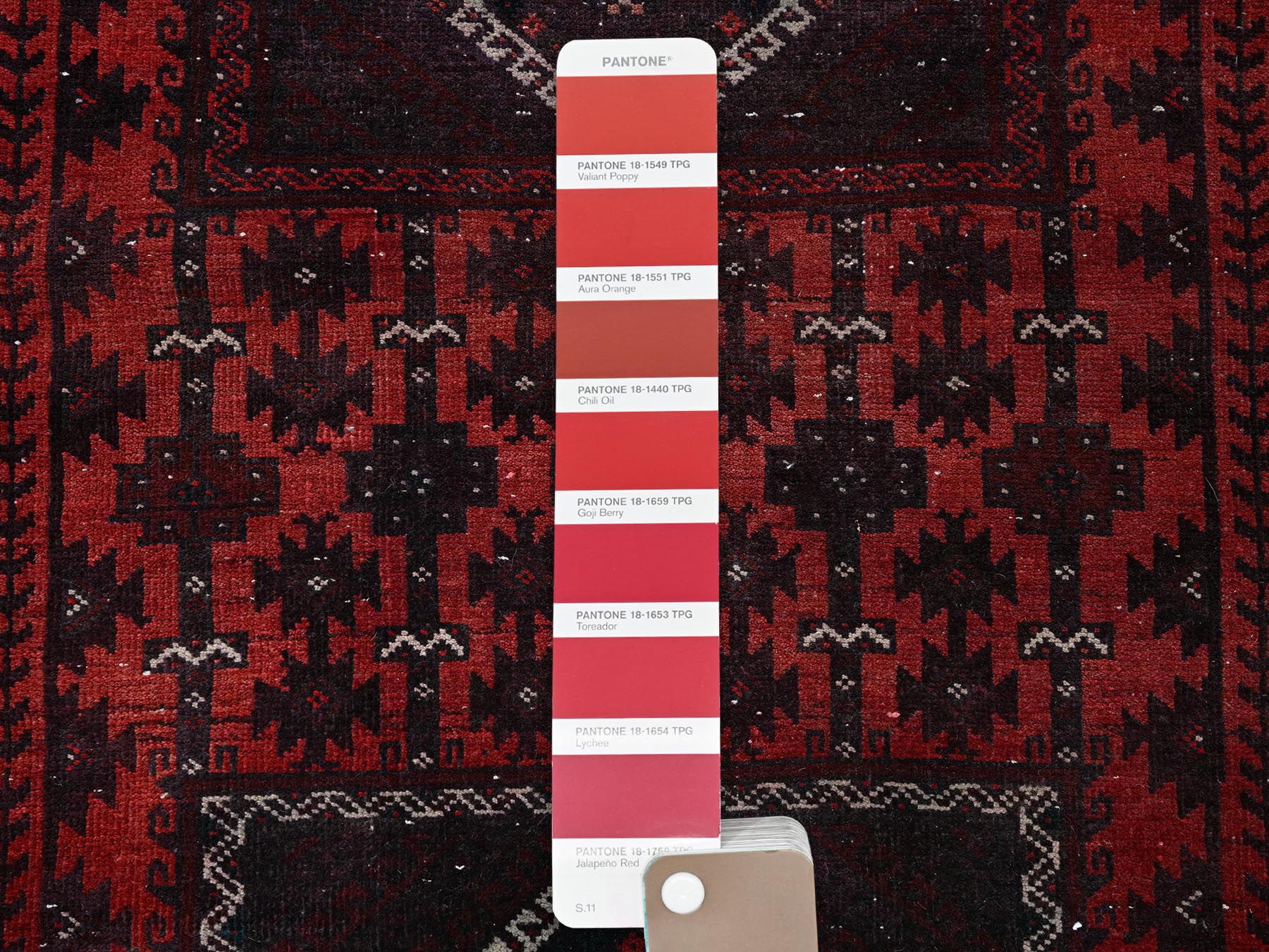 Baluch Vintage hand-knotted wool runner in Red & Chocolate Brown, 1'6" x 3'5" — SKU O0867 (view 4)