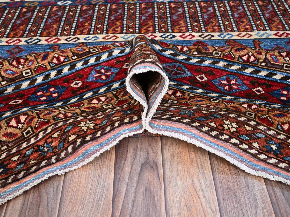 Tribal hand-knotted wool rug in Blue, 8'9" x 10'5", SKU O086977