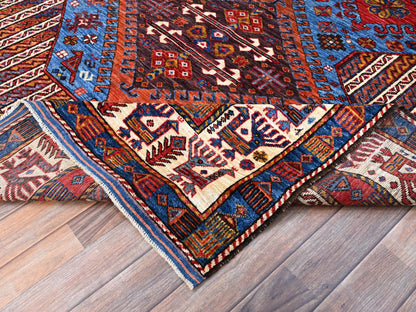 Tribal hand-knotted wool rug in Blue, 6'3" x 8'5", SKU O086978