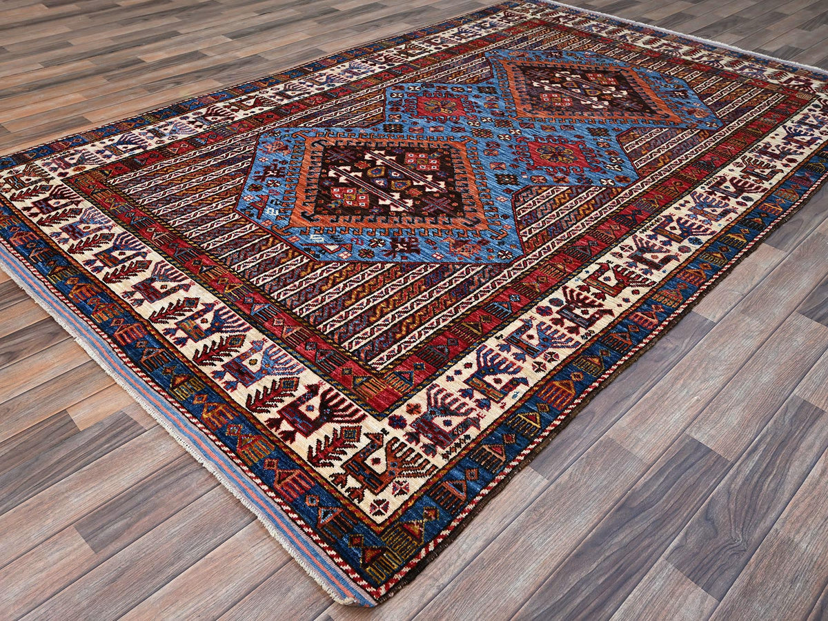 Tribal hand-knotted wool rug in Blue, 5'10" x 9'0", SKU O086981
