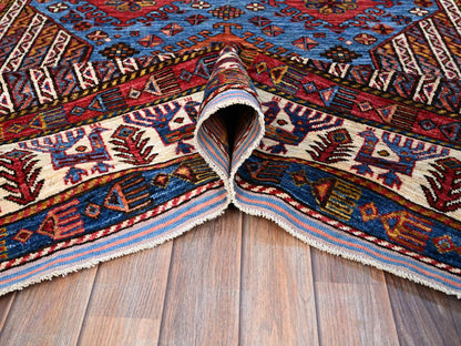 Tribal hand-knotted wool rug in Blue, 5'10" x 9'0", SKU O086981