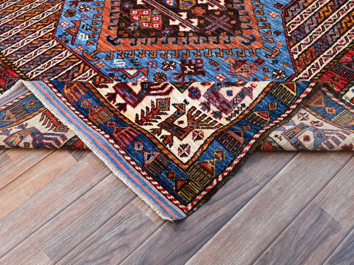 Tribal hand-knotted wool rug in Blue, 5'10" x 9'0", SKU O086981