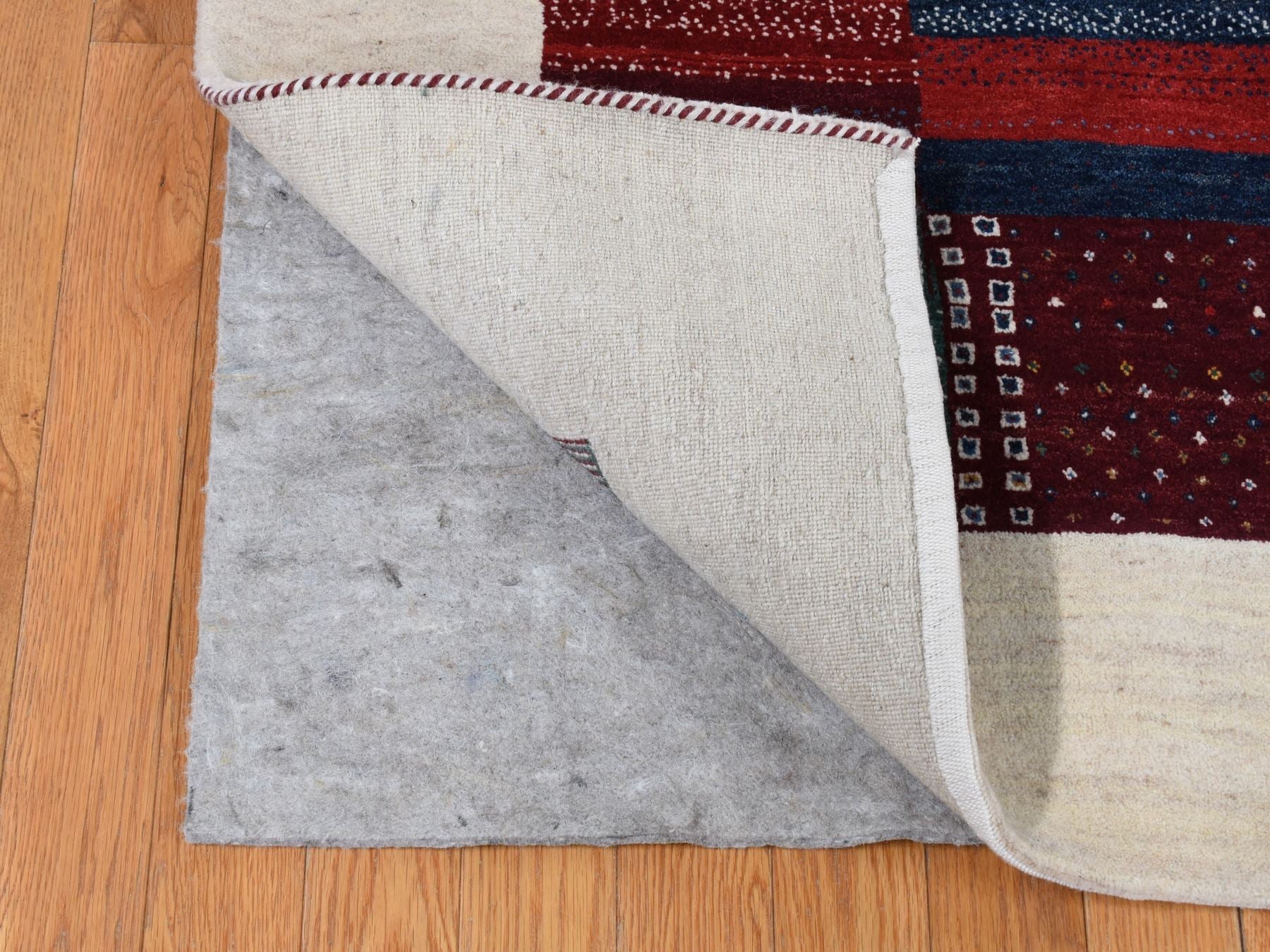Gabbeh Tribal & Geometric hand-knotted wool rug in Ivory, 8'3" x 9'9" — SKU O087044 (view 4)