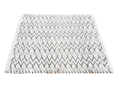 Modern / Contemporary hand-knotted wool rug in Ivory, 2'1" x 2'2" — SKU O087415