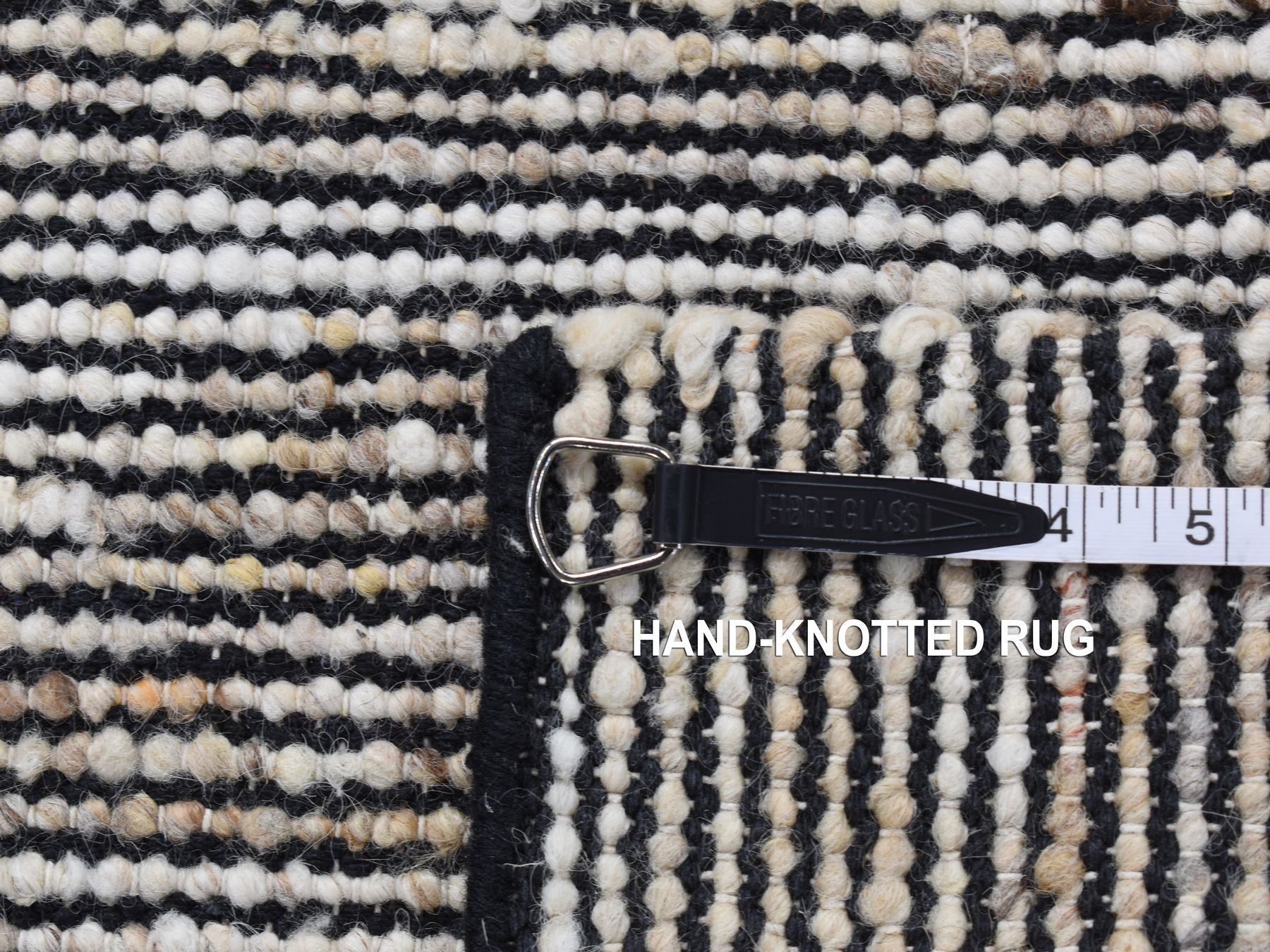 Modern / Contemporary hand-knotted wool rug in Ivory, 1'10" x 2'1" — SKU O087420 (view 6)