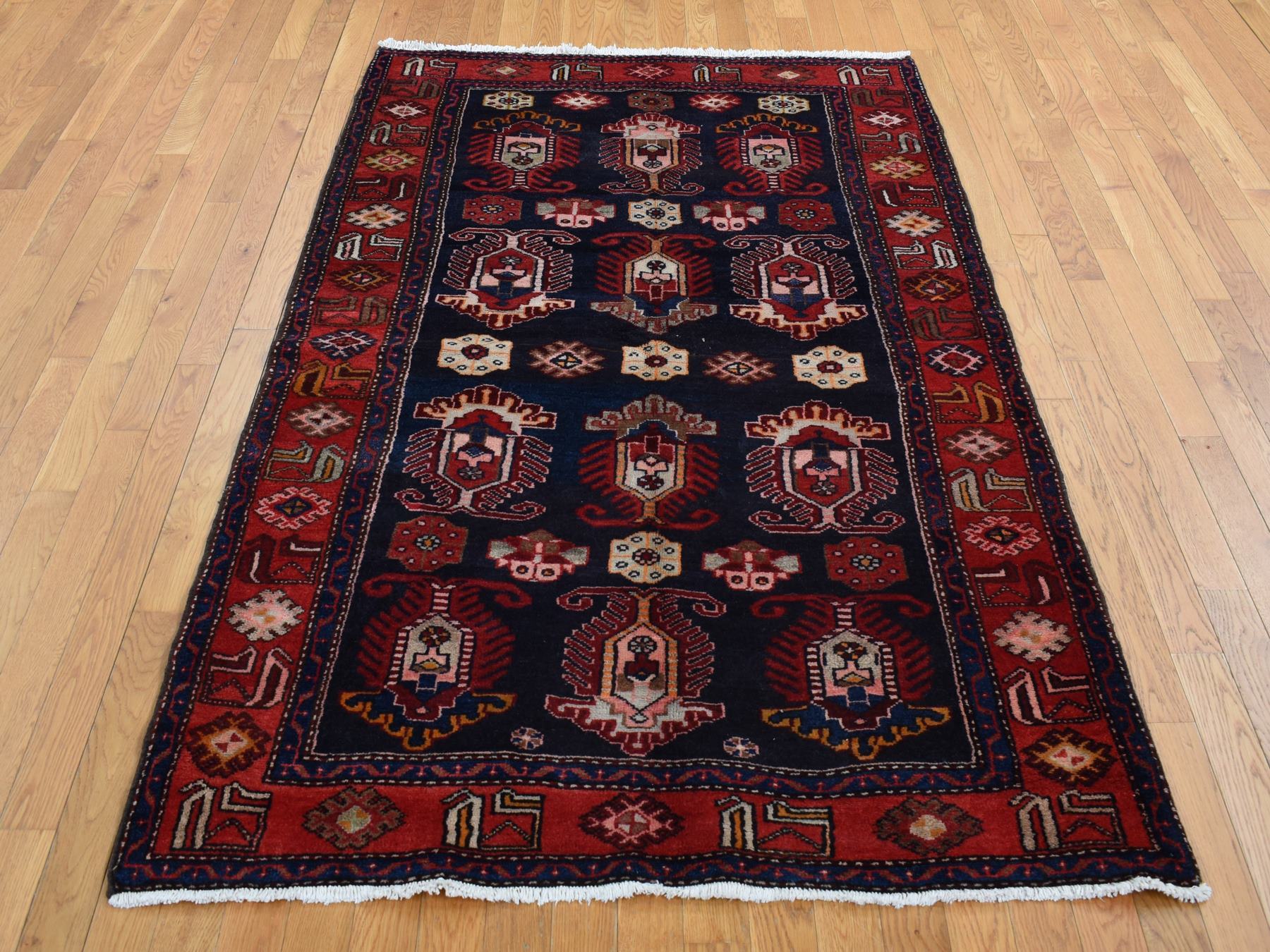 Malayer Persian hand-knotted wool rug in Red, 4'8" x 7' — SKU O087540 (view 2)