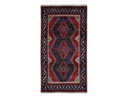 Persian hand-knotted wool rug in Red & Blue, 5'1" x 9'7" — SKU O087575