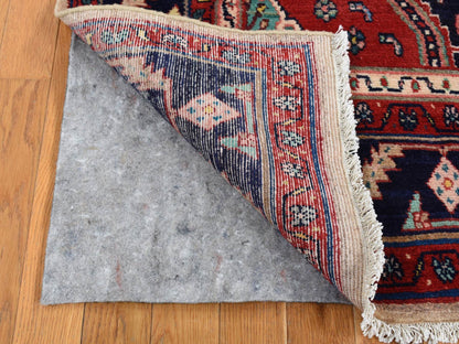 Persian hand-knotted wool rug in Red & Blue, 5'1" x 9'7" — SKU O087575 (view 4)