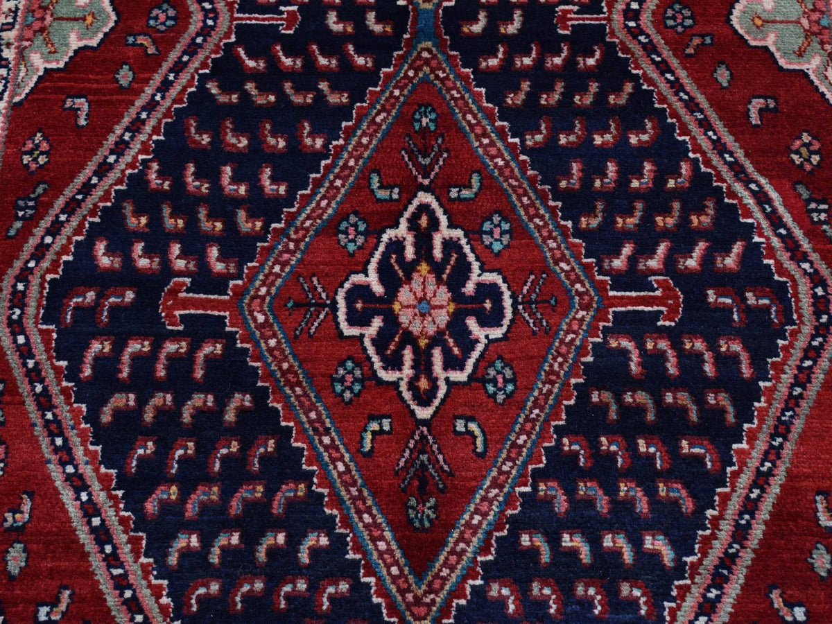 Persian hand-knotted wool rug in Red & Blue, 5'1" x 9'7" — SKU O087575 (view 8)
