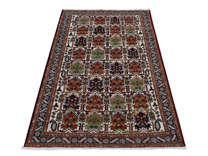 Persian hand-knotted wool rug in Ivory & Blue, 3'10" x 5'10" — SKU O087608