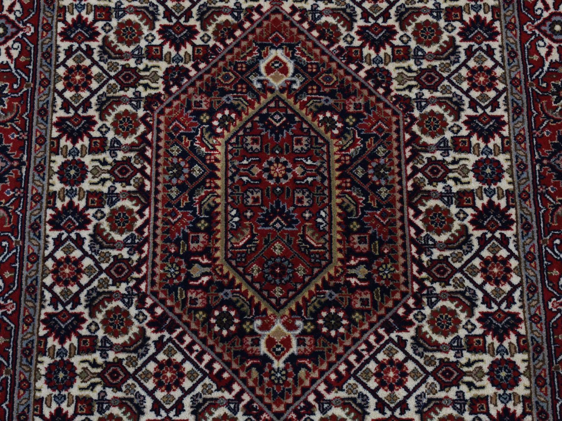 Fine Oriental hand-knotted wool runner in Ivory & Red, 2'9" x 11'4" — SKU O087728 (view 7)
