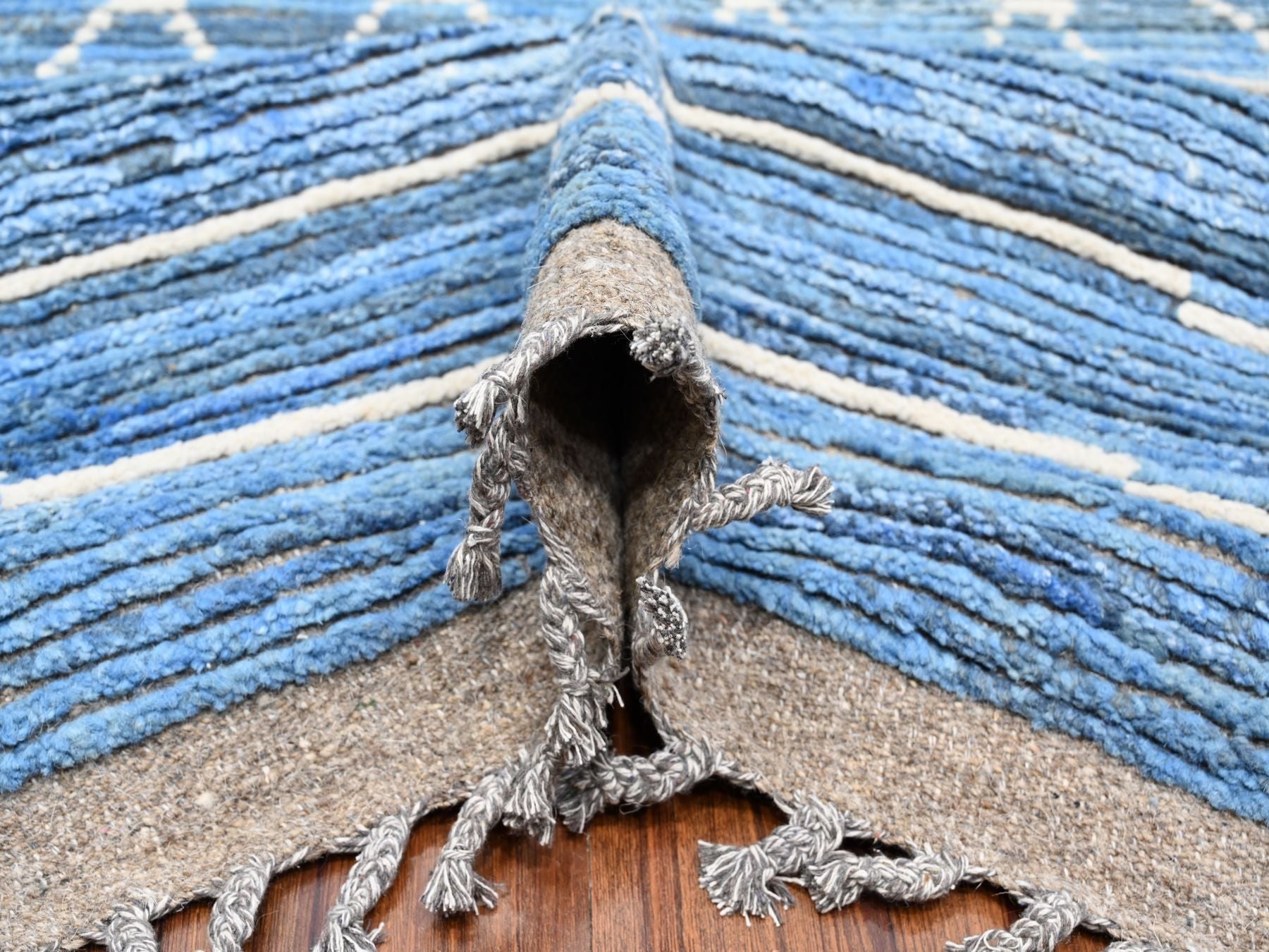 Tribal hand-knotted wool rug in Blue, 12'0" x 16'1", SKU O089135