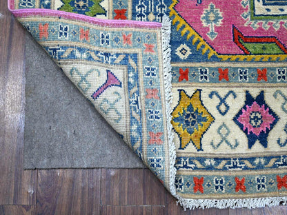 Pink 5'0" x 6'9" Tribal Hand knotted Wool Rug - Sku: O089338